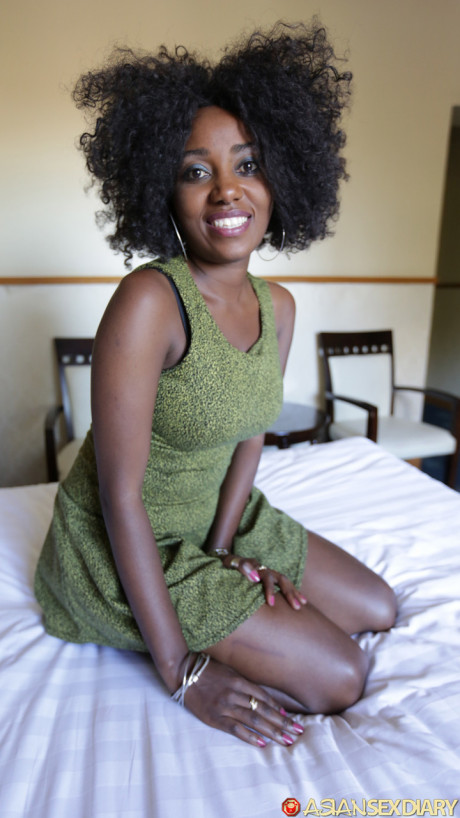 Ebony amateur with crazy hair Fifi shows her monstrous titties before hot POV sex