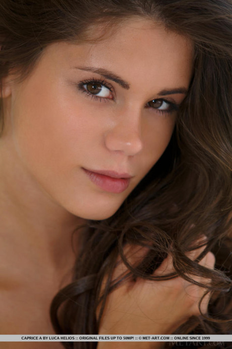 European undies model Caprice A undresses to pose for glamour spread