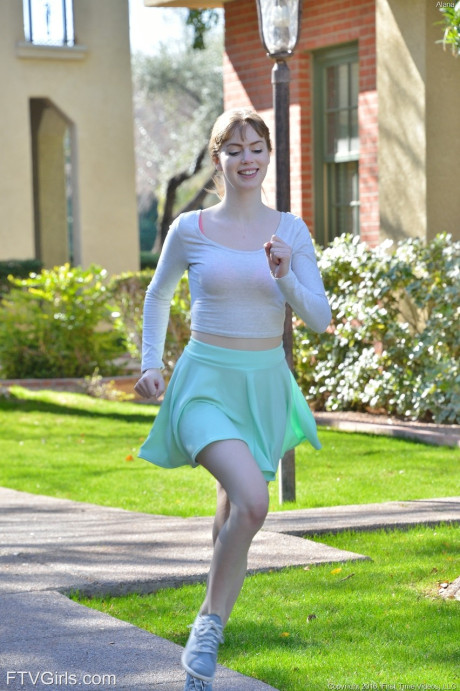 Beauty in stockings Alana toys her pussy and plays with her charming nipples