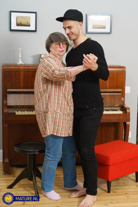 Sharon Amore is a horny granny who gets nailed by her toyboy student at home