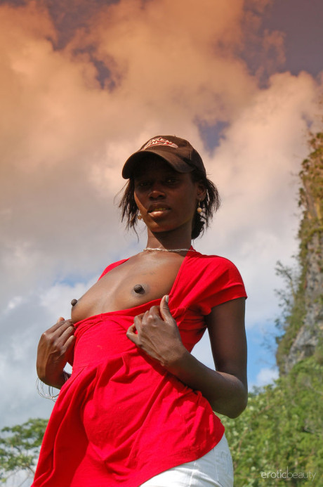 Exotic ebony Maria L strips undressed to show her hot chocolate body outdoors