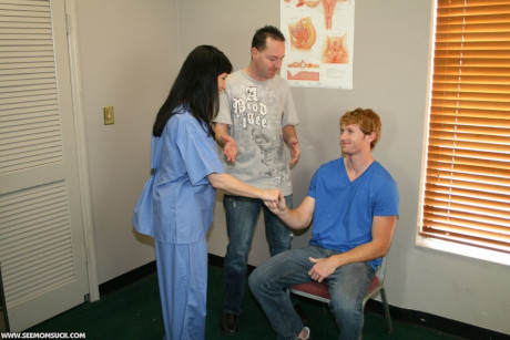 Dark haired MILF nurse gives a sexy lovely blowjob to her horny patient
