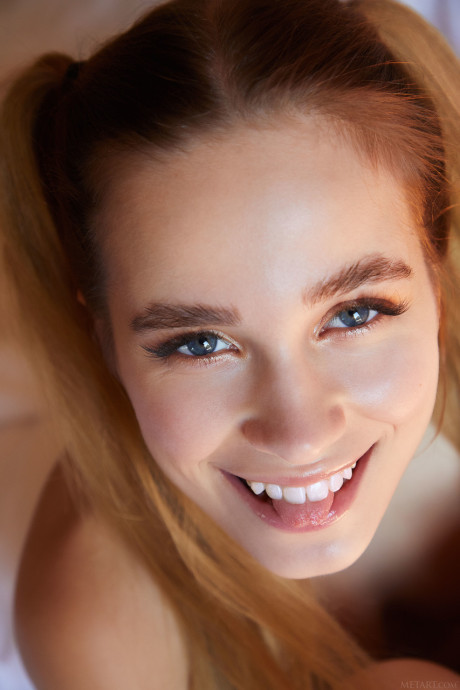 Redheaded goddess Cassia spreads her delicious twat and shows her huge ass