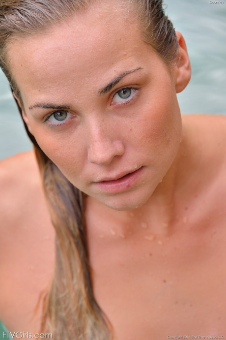 Glamour babe Courtney has a undressed swim after stuffing her snatch with sex balls