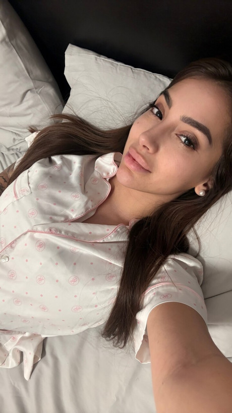 Solo model Haleema Ahmed takes a bunch of self shots while fully clothed