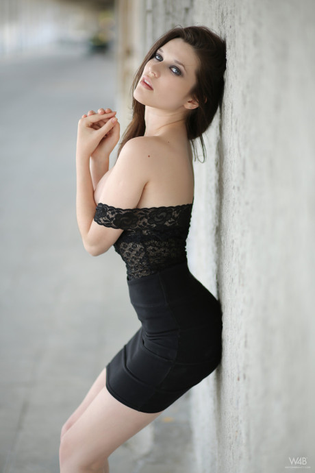 Shameless young Serena loses her pretty panties in public and poses in her dress