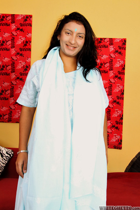 Chubby Indian broad Charumati A strips to her bra and undies in sandals