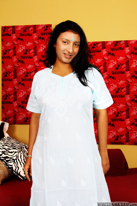 Chubby Indian broad Charumati A strips to her bra and undies in sandals