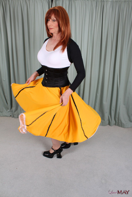 Ladyboy Lucimay showing off her long flowing dress and hard schlong