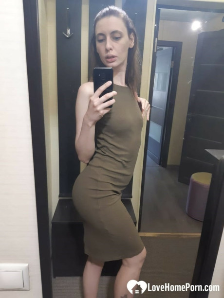 Pretty amateur shows every inch of her hot body while taking nude photos