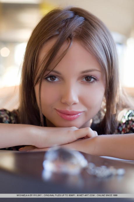 Gorgeous pretty face teenie Michaela A with unprotected feet showing perfect bald pussy