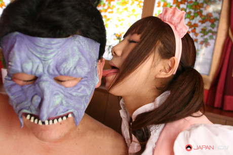 Asian maid Mahiru Tsubaki tastes two hairy cocks and eats white cum