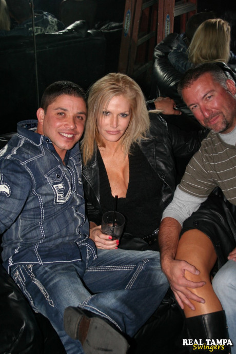 Yellow-haired swinger with giant juggs and her friends having fun in the night club