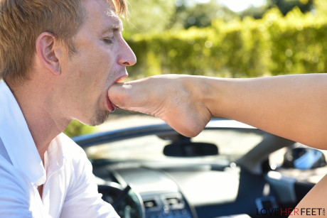 Naturally busty Lena Paul in high heels likes steamy foot play in sports car