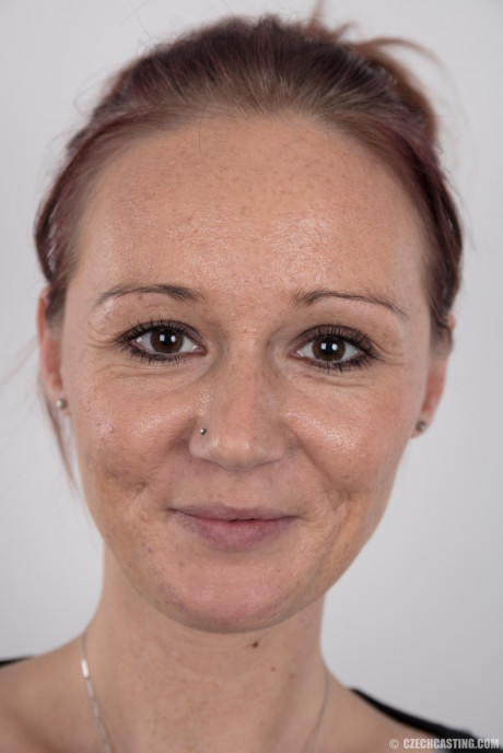 Amateur model Martina stands proud as she gets undressed for the very first time