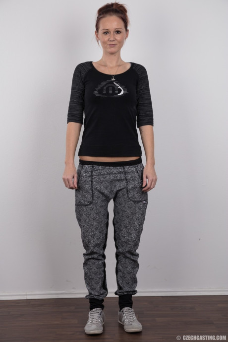 Amateur model Martina stands proud as she gets undressed for the very first time