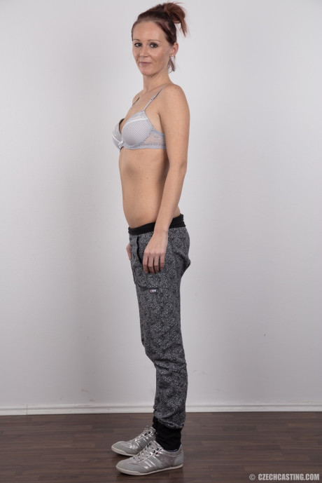 Amateur model Martina stands proud as she gets undressed for the very first time