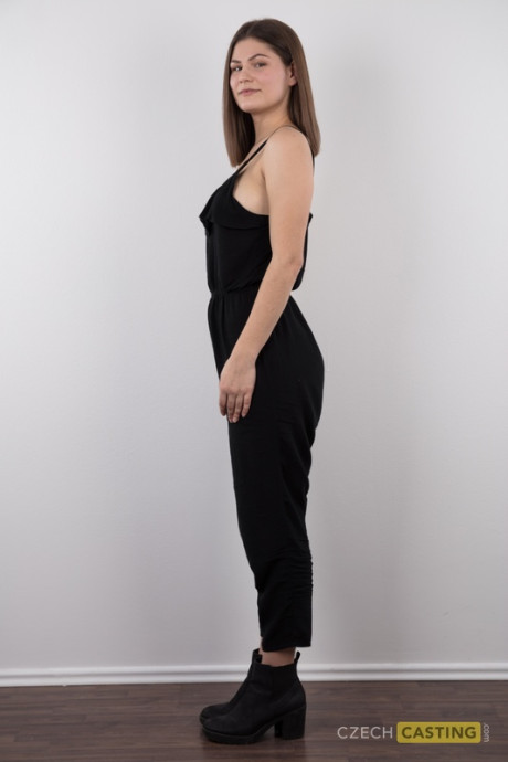 Brunette slut broad Tereza stands naked during her undressed debut before taking a rocker