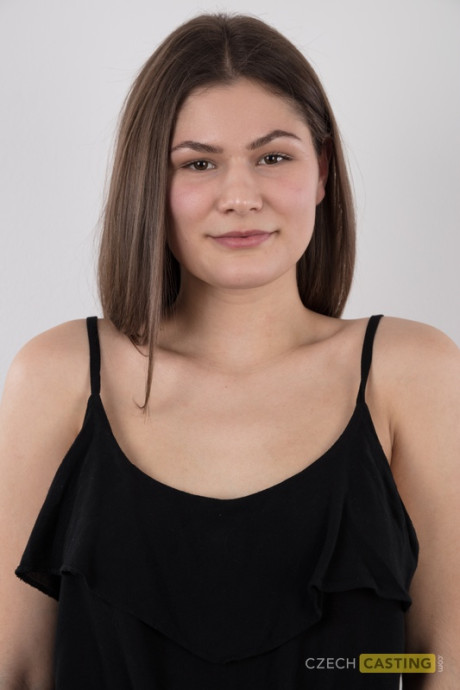 Brunette slut broad Tereza stands naked during her undressed debut before taking a rocker