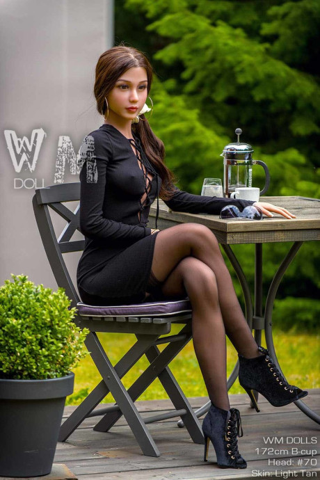 Glamorous sex doll Willa poses, strips and shows her breasts & butt outdoors