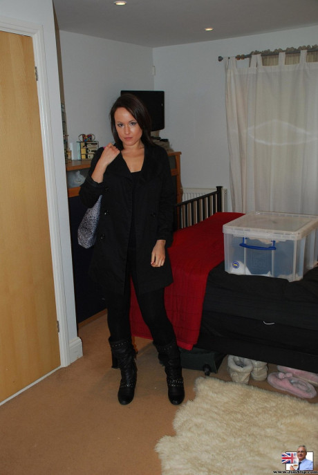 Schoolgirl brunette Lucy fingering her pussy in stockings and boots