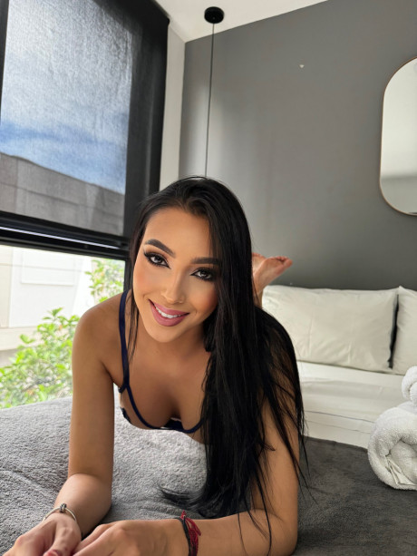 Raven haired sweety Ariana Vargas poses in sexy thongs and bras