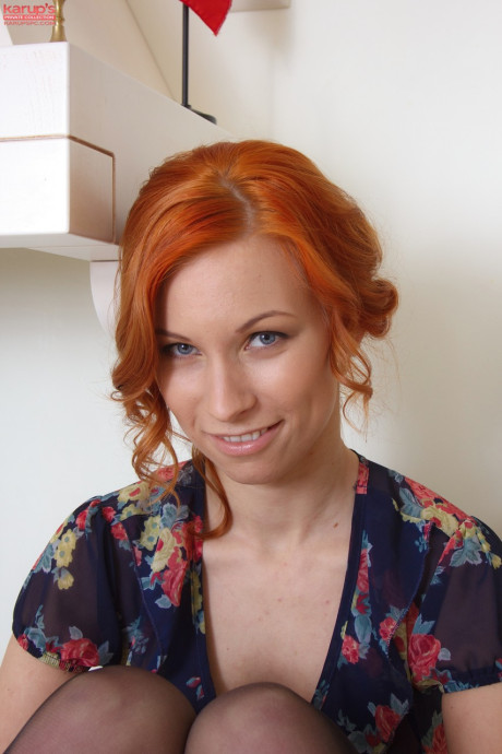 Stunning ginger head Daisy A shows her nice breasts & her shaved cunt in nylons