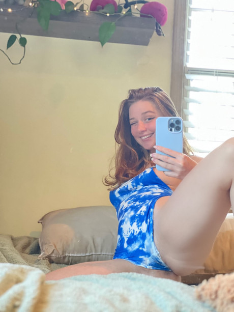 Fresh teenie amateur takes selfies while sporting micro skirts and thong lingerie