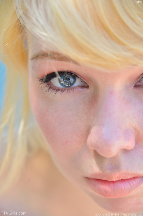 Blonde sweetie Astrid reveals her melons and flashes her cunt in public