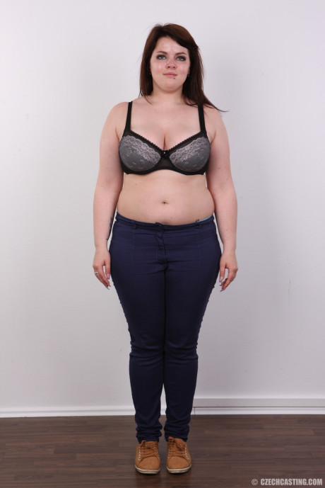 Amateur fatty Katherina stands nude before sitting to show her snatch