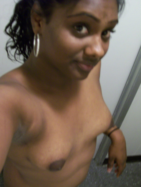 Ebony young Paris takes selfies while showing her enormous booty & puffy nipples