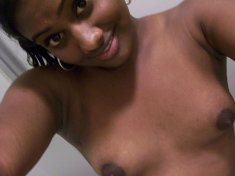 Ebony young Paris takes selfies while showing her enormous booty & puffy nipples