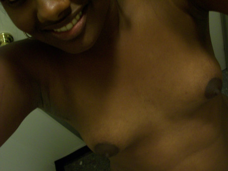 Ebony young Paris takes selfies while showing her enormous booty & puffy nipples