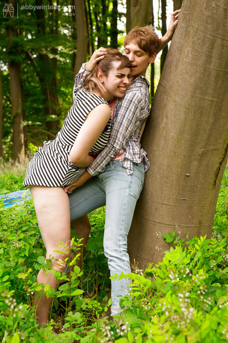 Short haired dykes Anahi and Nora go outdoors to finger each others twat