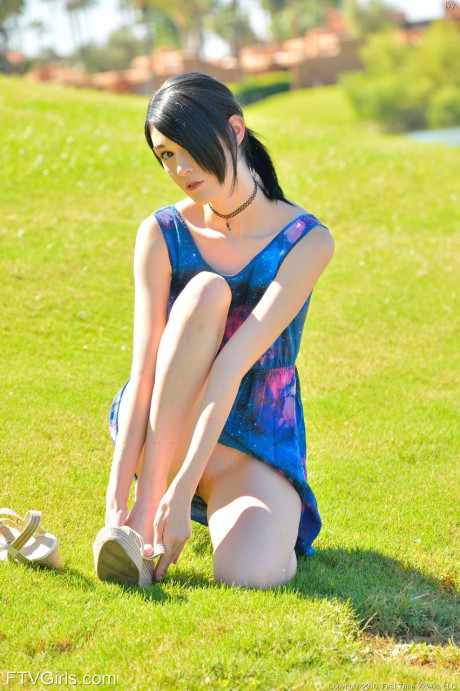 Extremely skinny Ivy inserts a mobile phone in her bald snatch & fists herself