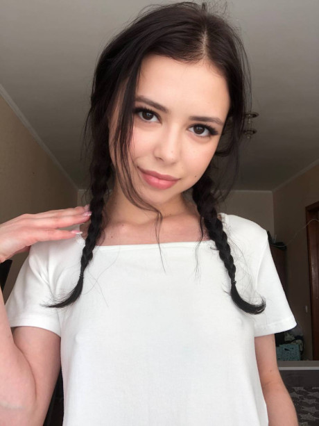 Ravishing sweet brunette young Molly Lo changes into a Wednesday Adams look