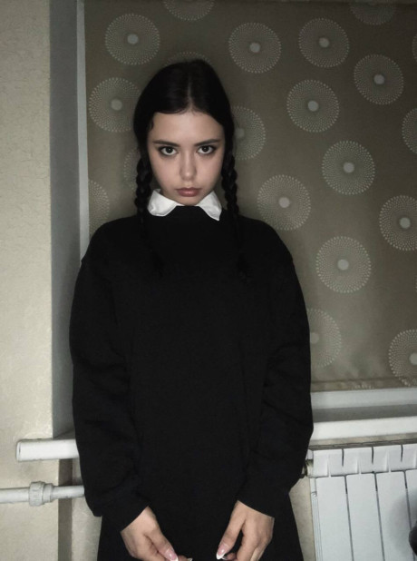 Ravishing sweet brunette young Molly Lo changes into a Wednesday Adams look