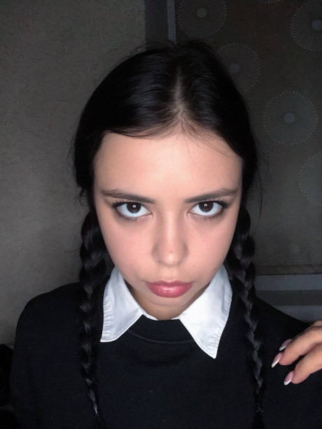 Ravishing sweet brunette young Molly Lo changes into a Wednesday Adams look