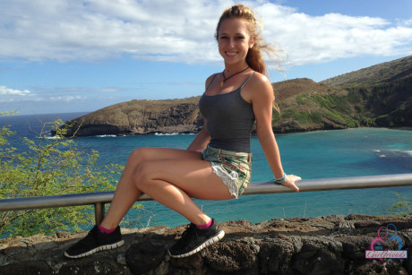 Amateur GF Taylor Whyte poses in a tight shirt & shorts by the sea
