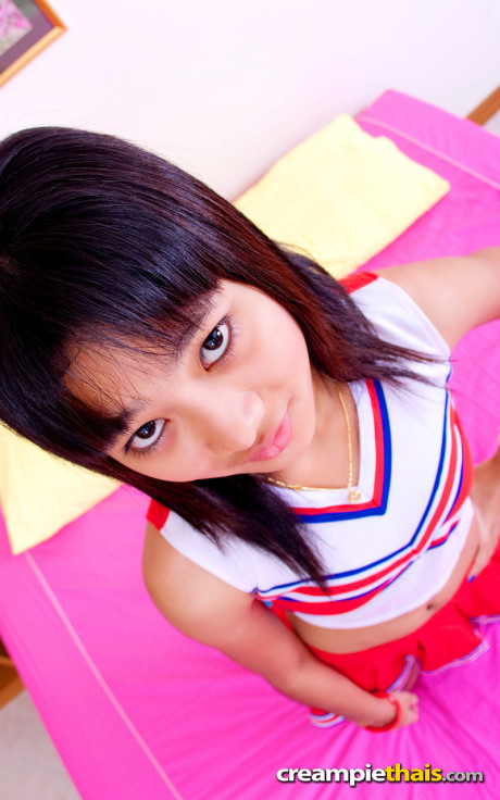 Chinese schoolgirl Powder unveils her tiny titties & her tight shaved cunt