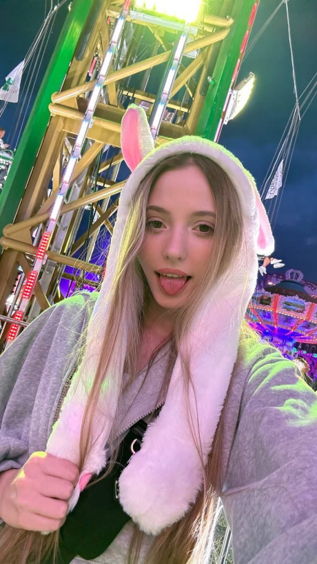 Pretty blonde young Katya Sun takes numerous self shots in SFW mode