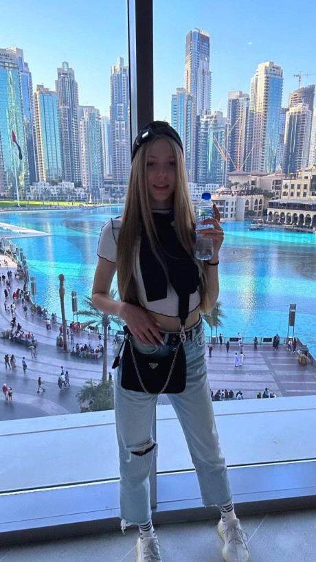 Pretty blonde young Katya Sun takes numerous self shots in SFW mode