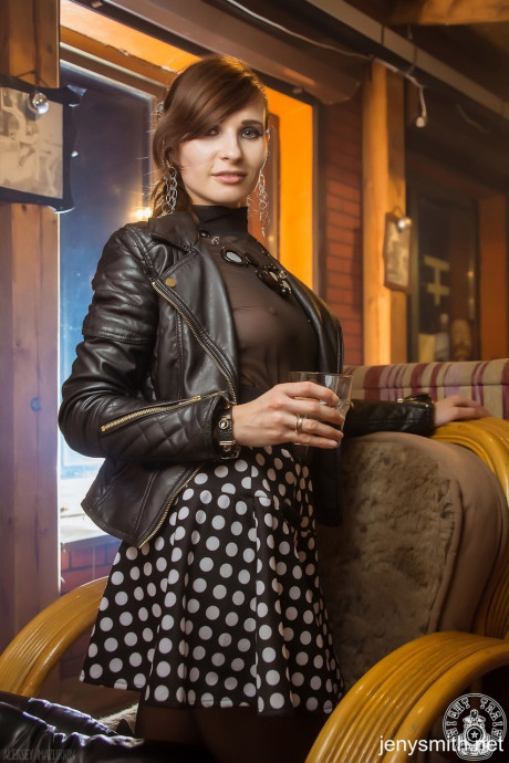 Sexpot in boots Jeny Smith gives an arousing upskirt in pantyhose in public