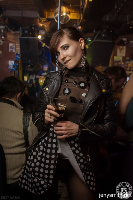 Sexpot in boots Jeny Smith gives an arousing upskirt in pantyhose in public