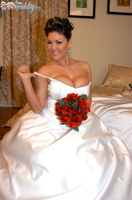 Horny bride Claire Dames loves licking her big melons and fingering her twat