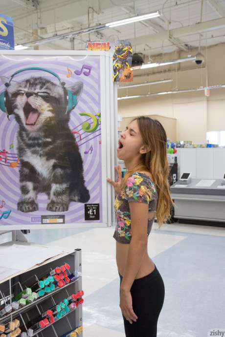 Young girlfriend Uma Jolie flashing her titties and her ass in a toy store