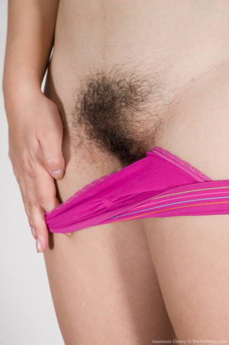 Amateur model Anastasia Cherry uncovers monstrous natural boobies before baring bush