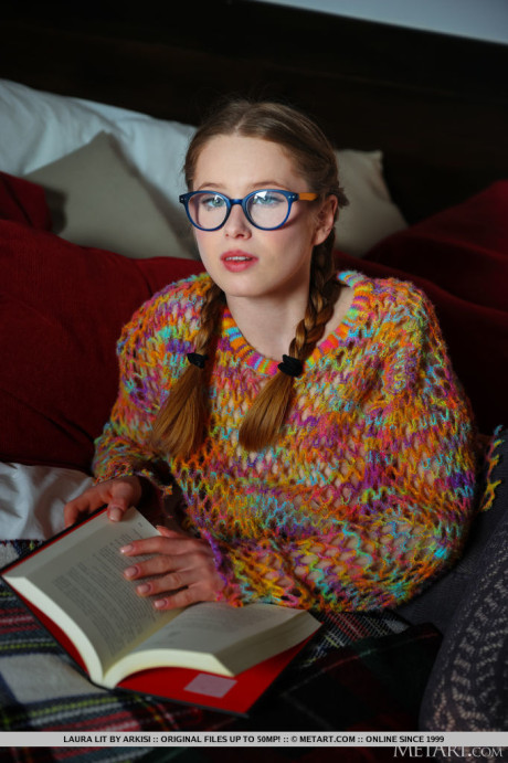 Young young whore girl lady Laura Lit gets undressed with her hair in braided pigtails