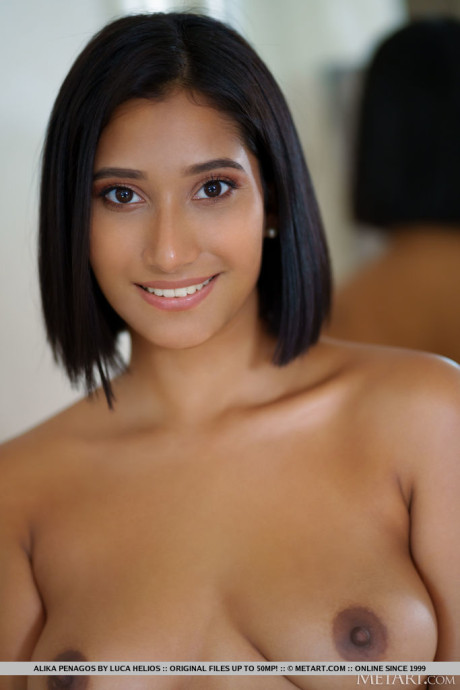 Stunning latina teenie Alika Penagos gets totally naked on a armchair