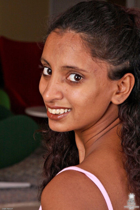 Lovely Indian babe Jhazira shows her natural boobies & spreads her shaved vagina
